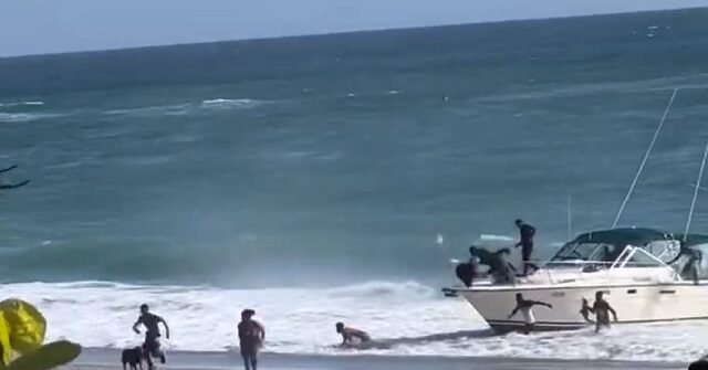 WATCH: 17 Migrants Make Boat Landing on Florida Beach