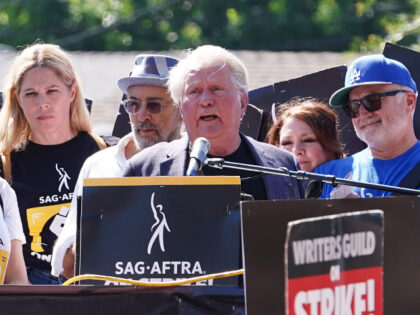 LOS ANGELES, CA - AUGUST 22: Martin Sheen walks the picket line in support of the SAG-AFTR