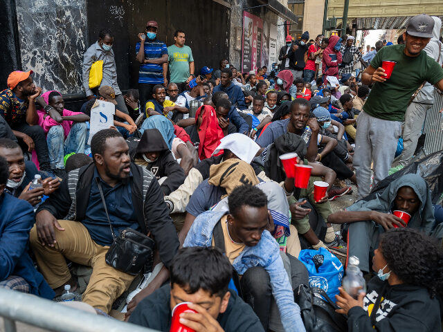 NEW YORK, NEW YORK - AUGUST 01: Dozens of recently arrived migrants to New York City camp outside of the Roosevelt Hotel, which has been made into a reception center, as they try to secure temporary housing on August 01, 2023 in New York City. The migrants, many from Central …
