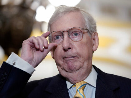 Senate Minority Leader Mitch McConnell, R-Ky., listens to reporters after a policy luncheon, Tuesday, July 11, 2023, on Capitol Hill in Washington. (AP Photo/Mariam Zuhaib)