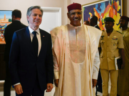 US Secretary of State Antony Blinken, left, poses for a photo with Nigerien President Mohamed Bazoum during their meeting at the presidential palace in Niamey, Niger, Thursday, March 16, 2023. Blinken traveled to Ethiopia and Niger as the Biden administration accelerates a push to engage with Africa to counter China's …
