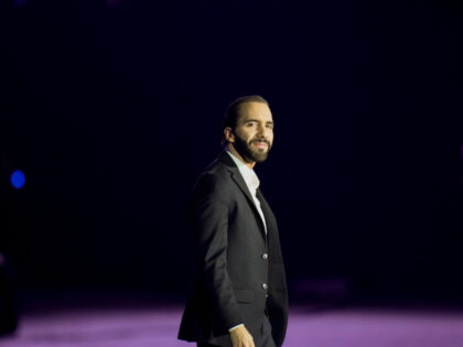 Salvadoran President Nayib Bukele walks on the stage after speaking during the opening ceremony of the Central American and Caribbean Games in San Salvador, El Salvador, Friday, June 23, 2023. (AP Photo/Arnulfo Franco)