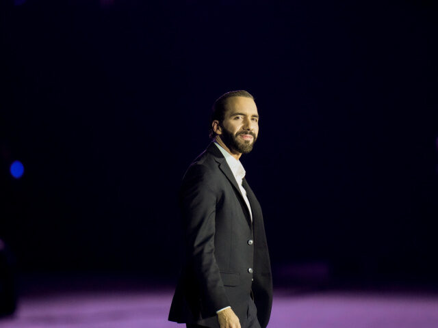 Salvadoran President Nayib Bukele walks on the stage after speaking during the opening cer