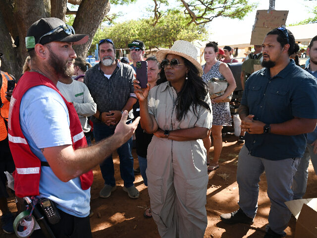 HONOKOWAI, HI- AUGUST 13: Oprah Winfrey meets people at a distribution and aid site at Hon