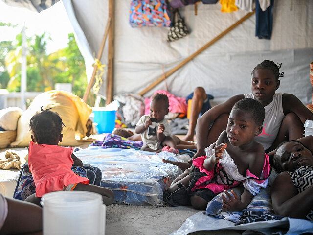 Families fleeing gang violence gather in Delmas 75 comune, Port-au-Prince on June 28, 2023