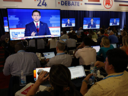 MILWAUKEE, WISCONSIN - AUGUST 23: Reporters watch Republican presidential candidate, Flori