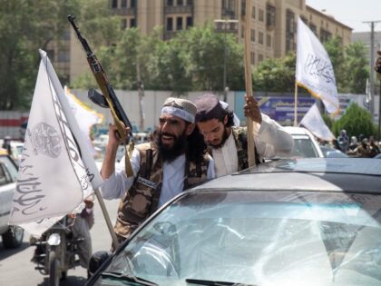 KABUL, AFGHANISTAN - AUGUST 15: Taliban supporters parade through the streets of Kabul on