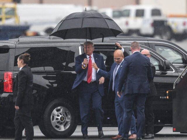 Former US President and 2024 hopeful Donald Trump arrives to Ronald Reagan Washington National Airport in Arlington, Virginia, on August 3, 2023, after his arraignment in court. Trump pleaded not guilty Thursday, August 3, to historic charges that he led a criminal conspiracy seeking to defraud the American people by …