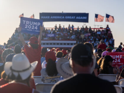 WACO, TEXAS - MARCH 25: Supporters cheer as former U.S. president Donald Trump speaks at the Waco Regional Airport on March 25, 2023 in Waco, Texas. Former U.S. president Donald Trump attended and spoke at his first rally since announcing his 2024 presidential campaign. Today in Waco also marks the …