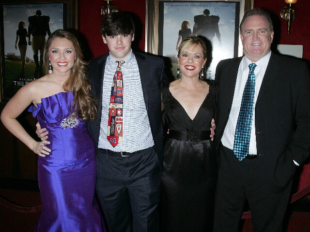 NEW YORK - NOVEMBER 17: (L-R) The family the film is based on Collins Tuohy, Sean Tuohy Jr