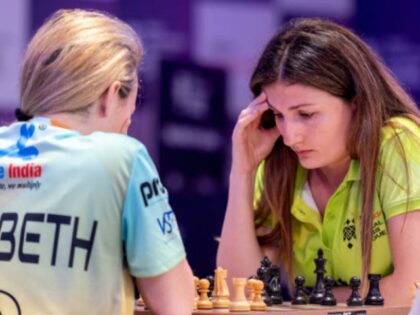 DUBAI, UAE - JUNE 23: The chess player Elisabeth Paehtz from Germany (L) compete with ches