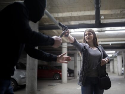 Woman with gun for self-defense