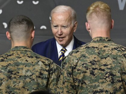 HAVELOCK, USA - NOVEMBER 21: One day after his 80th birthday President Joe Biden serves food during the Friendsgiving dinner with servicemembers and military families as part of the White Houseâs Joining Forces Initiative at the Marine Corps Air Station Cherry Point in Havelock NC, United States on November 21, …