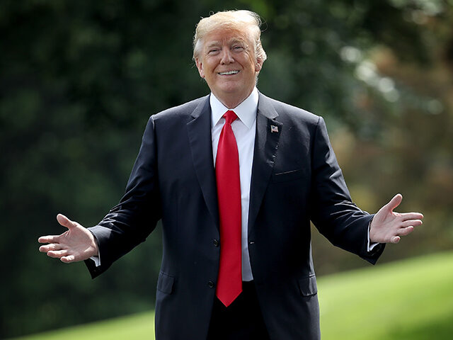 U.S. President Donald Trump gestures toward journalists shouting questions as he departs the White House May 29, 2018 in Washington, DC. Trump is scheduled to travel to Nashville, Tennessee later today for a campaign rally. (Photo by Win McNamee/Getty Images)