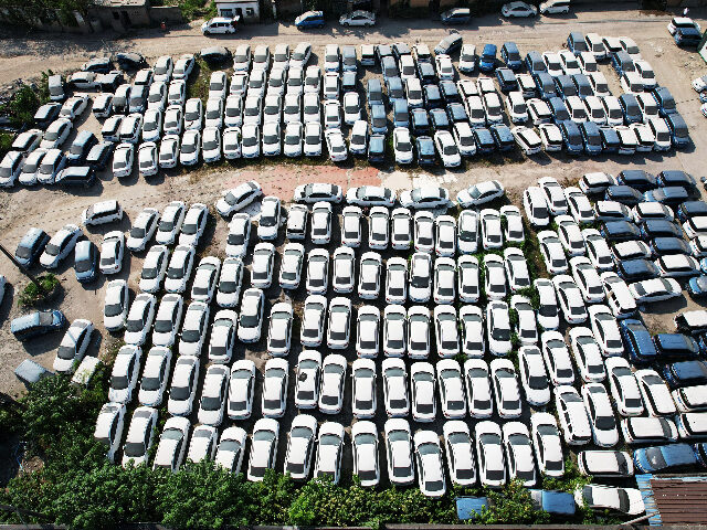 HANGZHOU, CHINA - JULY 28, 2021 - Drone photo show car "cemetery" formed by near