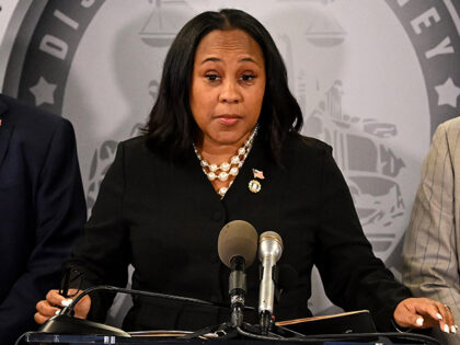 Fulton County District Attorney Fani Willis speaks during a news conference at the Fulton