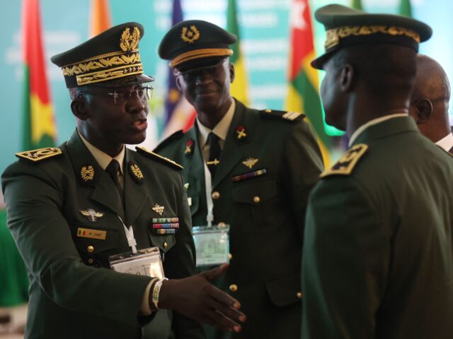 Members of the Armed Forces of Senegal discuss on the sidelines of the Economic Community