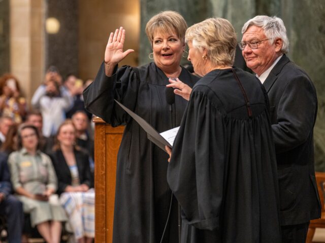 MADISON, WISCONSIN - August 1: Janet Protasiewicz, 60, is sworn in for her position as a S