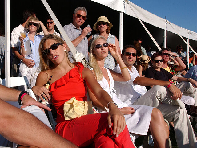 Spectators watch the Mercedes-Benz Polo Challenge July 21, 2001 in Bridgehampton, NY. The