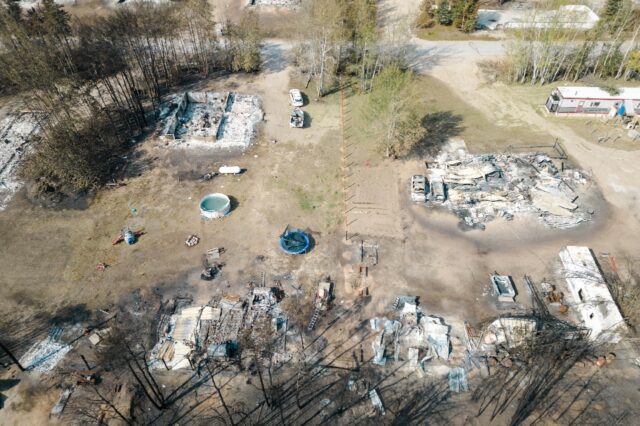 An aerial view shows charred remains of Enterprise in the Northwest Territories, a tiny ha