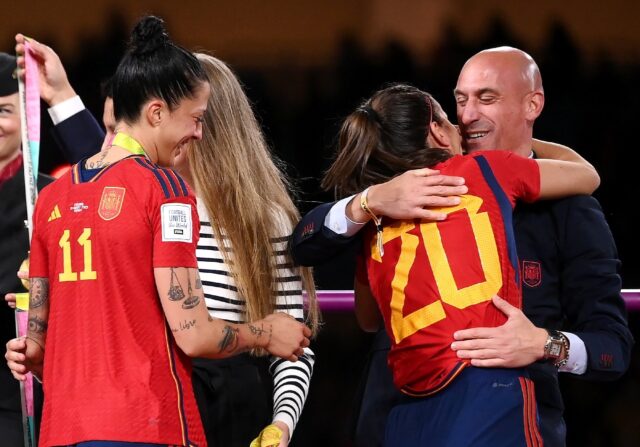 At the presentation after the World Cup final Luis Rubiales hug defender Rocio Galvez whil