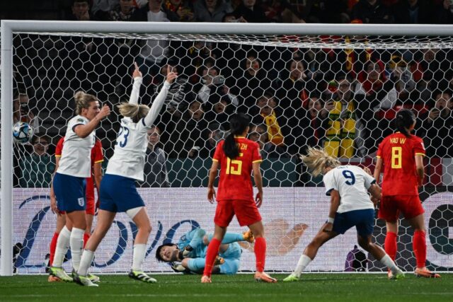 England players celebrate after scoring against China