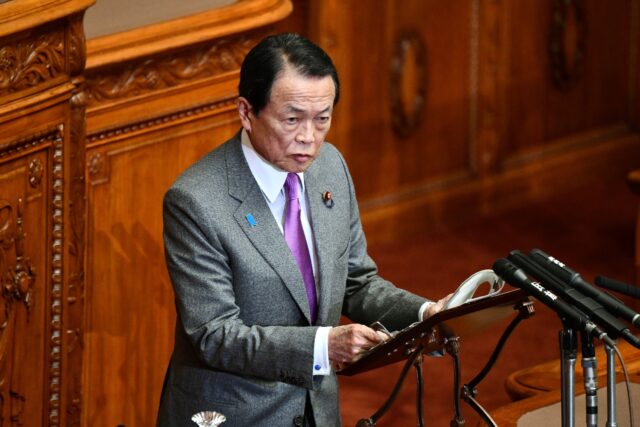 Ex-Japanese prime minister Taro Aso said the international community must 'wake up' to the