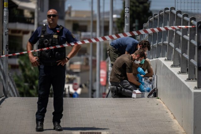 Greek police search for evidence after the fatal stabbing of a fan which saw the Champions