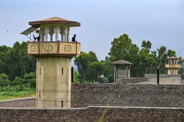 Guards stand sentinel from a watchtower at Attock Jail where former Pakistan prime ministe