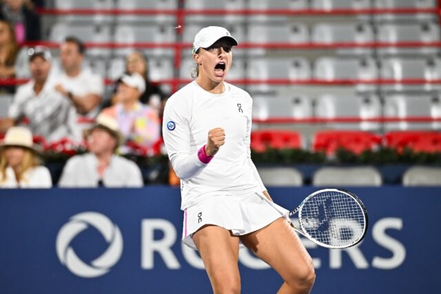 Iga Swiatek of Poland celebrates her quarter-final victory over American Danielle Collins