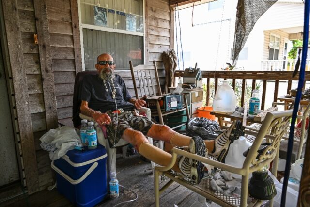 John Paul Nohelj prepares to stay in his house as Hurricane Idalia approaches in Steinhatc