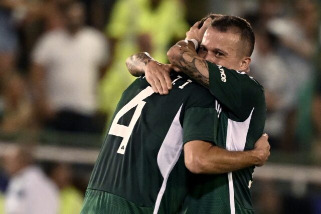 Late show: Panathinaikos' Brazilian midfielder Bernard (right) celebrates with Ruben Perez