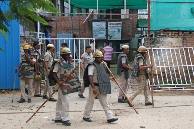 Most mosques were shut for Friday prayers in an important business hub on the outskirts of