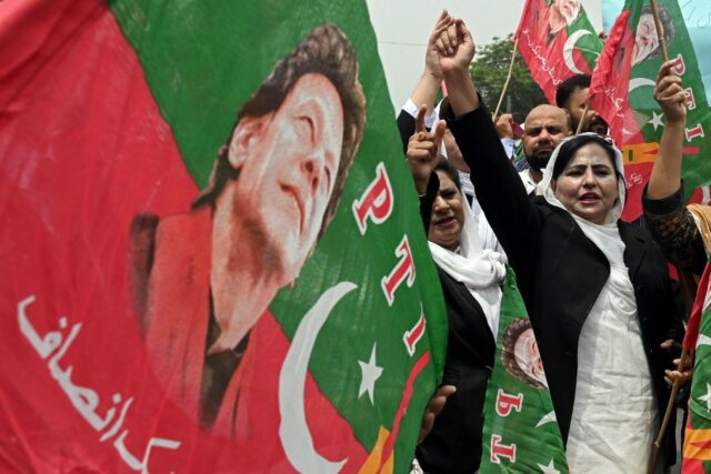 A small group of lawyers who also support Khan staged a protest against his jailing outsid