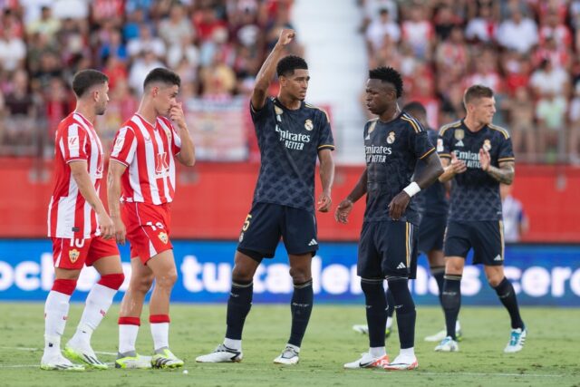 Real Madrid's English midfielder Jude Bellingham (C) struck his second and third goals for