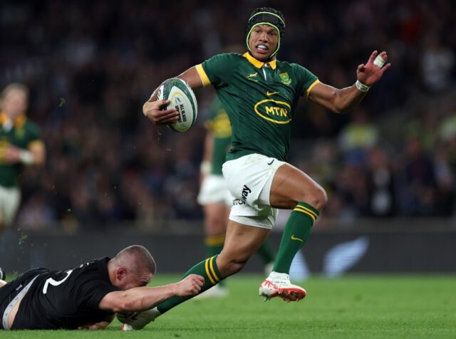 South Africa wing Kurt-Lee Arendse breaks clear to score the Springboks' second try agains