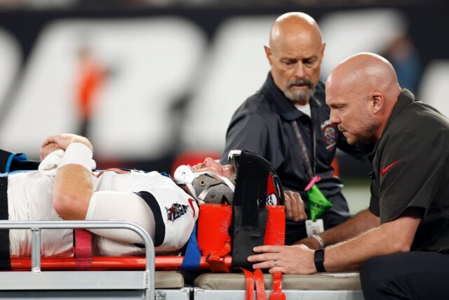 Tampa Bay Buccaneers quarterback John Wolford is taken off the field after being injured i