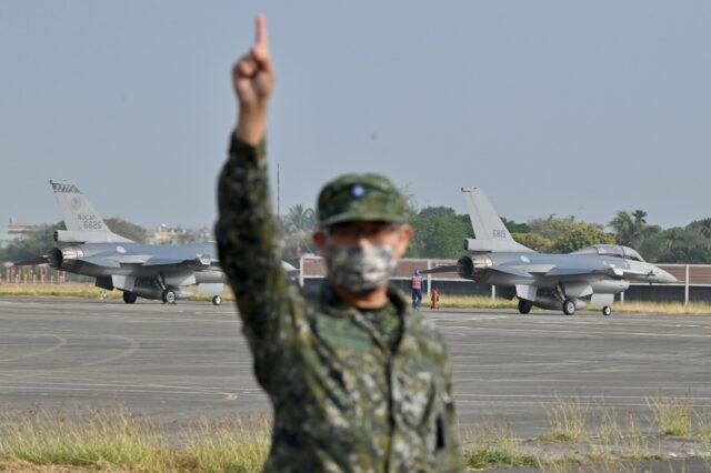 Two US-made F-16 V jet fighters are seen on the runway at an air force base in Chiayi coun