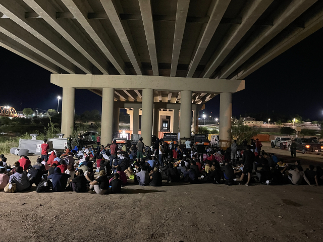More than 1,500 migrants crossed the border from Mexico into Eagle Pass, Texas, on Monday morning. (Randy Clark/Breitbart Texas)
