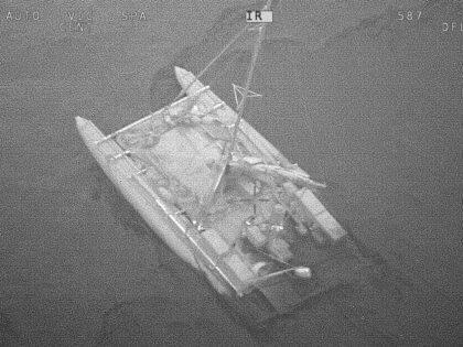 In this photo provided by the Australian Maritime Safety Authority, a partially submerged catamaran is shown during a rescue of 3 sailors in the Coral Sea, Wednesday, Sept. 6, 2023. Three sailors from Russia and France were rescued on Wednesday after the inflatable catamaran they were trying to navigate from …