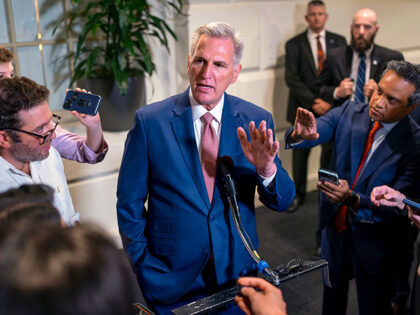 Speaker of the House Kevin McCarthy, R-Calif., talks to reporters about avoiding a government shutdown and launching an impeachment inquiry into President Joe Biden, following a closed-door meeting with fellow Republicans at the Capitol in Washington, Thursday, Sept. 14, 2023. (AP Photo/J. Scott Applewhite)