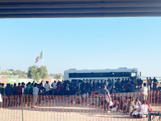 Border Patrol agents detain migrants waiting for backlogged shipments.  (Randy Clark/Breitbart, Texas)