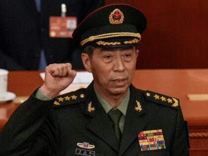 Newly elected Chinese Defense Minister Gen. Li Shangfu takes his oath during a session of China's National People's Congress (NPC) at the Great Hall of the People in Beijing on March 12, 2023. Russian President Vladimir Putin met with Li on Sunday, April 16, 2023, underscoring Beijing's strengthening engagement with …