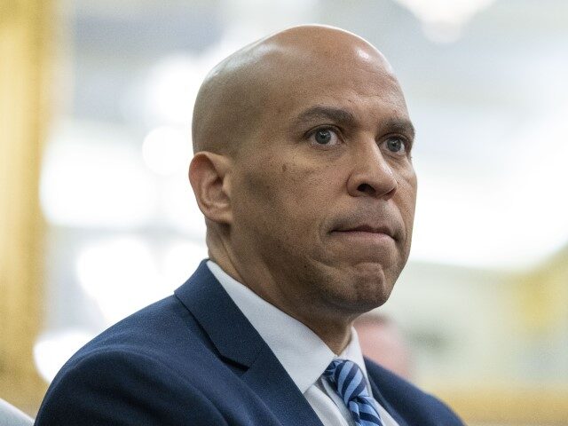 Sen. Cory Booker, D-N.J., listens during a Senate hearing on Capitol Hill, March 16, 2023 in Washington. Booker is calling on Sen. Bob Menendez to resign, saying in a statement that the federal bribery charges unveiled on Friday against his fellow New Jersey Democrat contain ”shocking allegations of corruption and …