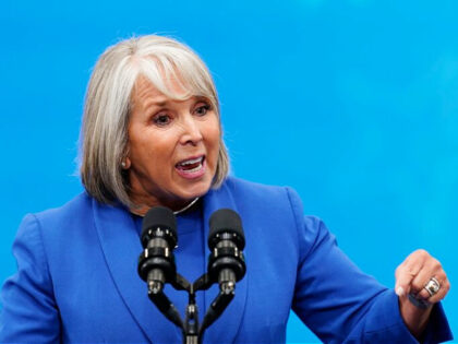 Democratic New Mexico Gov. Michelle Lujan Grisham talks prior to President Joe Biden speaking about the economy at Arcosa Wind Towers factory Wednesday, Aug. 9, 2023, in Belen, N.M. (AP Photo/Ross D. Franklin)