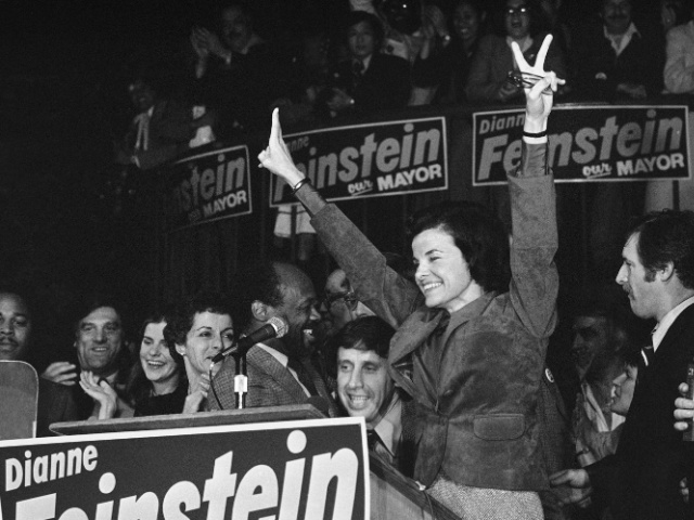 FILE - San Francisco Mayor Dianne Feinstein, who was appointed mayor after the assassination of Mayor George Moscone in San Francisco, on December 12, 1979, won the office in her own right, defeating challenger Quentin Cobb by a large majority.  With her on the victory podium, from left, are Moscone's widow, Gina Moscone, Assemblyman Willie Brown and Feinstein's fiancé, Richard Bloom.  (AP Photo/Sal Feder, File)