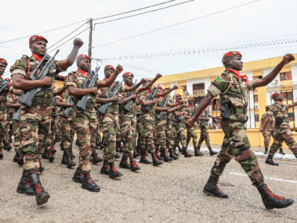 Members of the military take part in the military parade in honour of General Brice Oligui Nguema (unseen) who was inaugurated as Gabon's interim President, in Libreville on September 4, 2023. Gabon's coup leader vowed after being sworn in as interim president on September 4, 2023 to restore civilian rule …