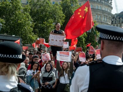 LONDON, ENGLAND - AUGUST 17: Pro Chinese government protestors shout at pro Democracy protestors in Trafalgar square on August 17, 2019 in London, England. The 'Stand With Hong Kong Protest' attracted up to one thousand mainly British Chinese protestors in support of the protests in Hong Kong. A similar number …