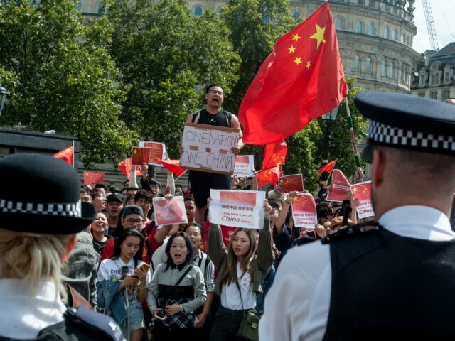 LONDON, ENGLAND - AUGUST 17: Pro Chinese government protestors shout at pro Democracy prot