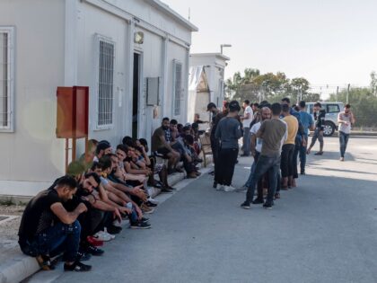 Syrian refugees rest inside the Temporary Accommodation Centre in Kokkinotrimithia, some 20 kilometres outside the Cypriot capital Nicosia on November 5, 2019. - Cyprus police said they towed to shore 131 migrants, almost all from Syria, after they were sighted on an overcrowded boat off the Mediterranean islands northwest tip. …